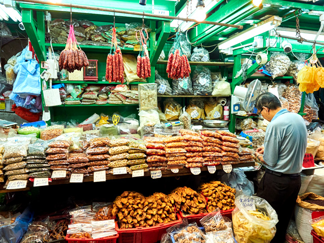 A street stall selling dried seafood and preserved food products.